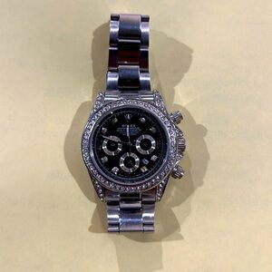 UA name brand watch. Great condition. Needs battery. Quartz movement. No box.